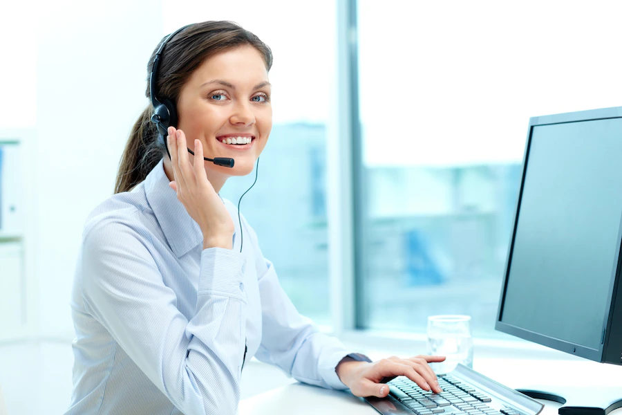 female call center agent talking to a customer to solve an issue with the help of process automation