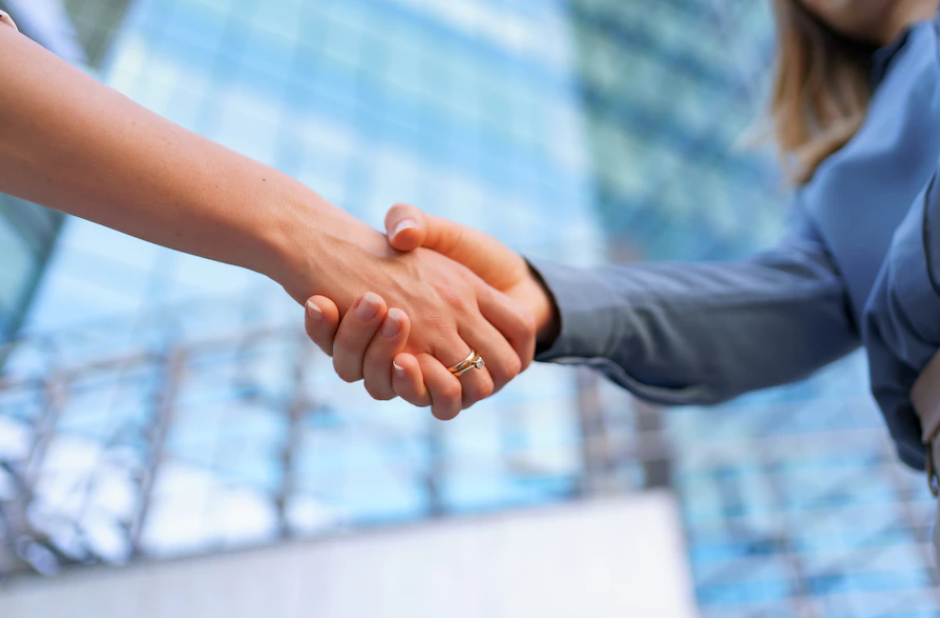 Two people shaking hands