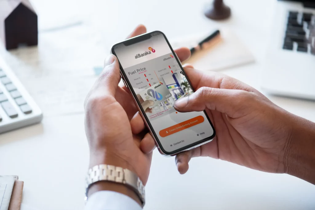 A man creating an account on AlBaraka's AI-powered online banking application, eKYC to seamlessly self-serve and become more self-sufficient