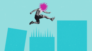Man skillfully leaping over three tall buildings, with a daring mid-air jump over the central building which features sharp spikes protruding from its rooftop.
